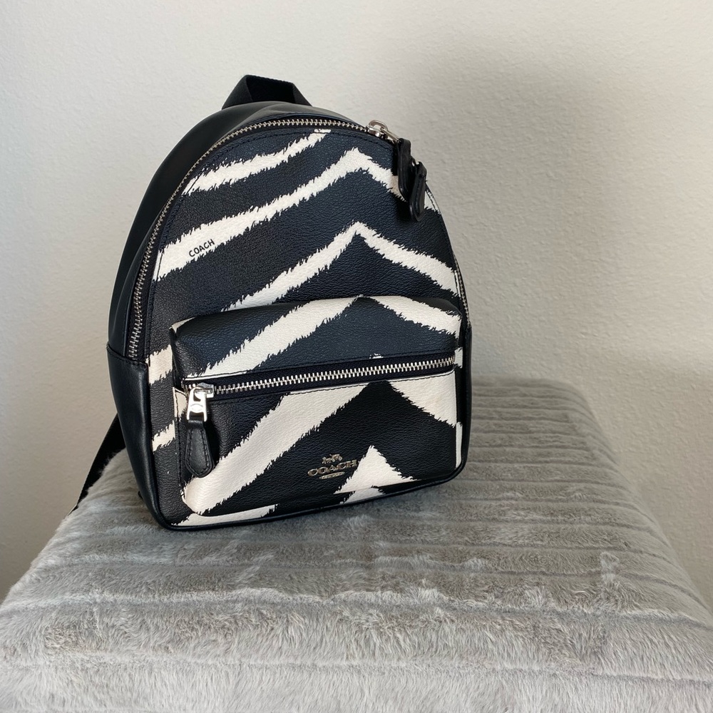 cow print Coach backpack